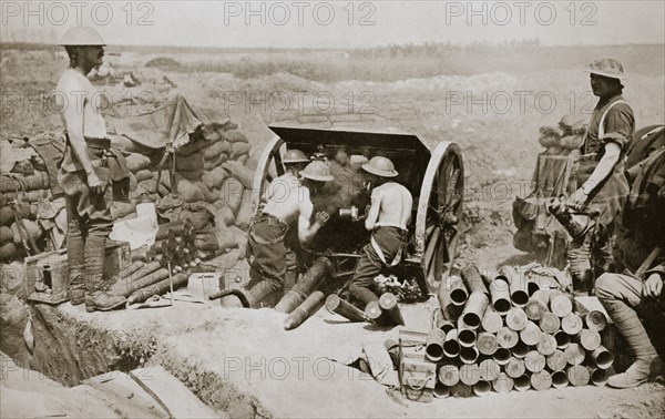 'Hot work at the guns', Somme campaign, France, World War I, 1916. Artist: Unknown