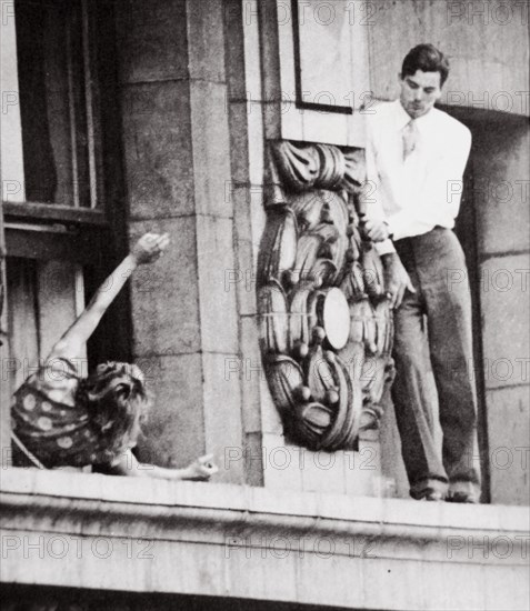 John Warde, out on a ledge on the 17th floor of the Hotel Gotham, New York, USA, 1938. Artist: Unknown