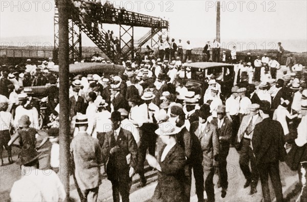 African Americans and whites leaving the beach as trouble begins, Chicago, Illinois, USA, c1919. Artist: Unknown