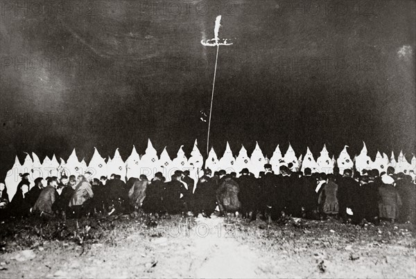 Ku Klux Klan initiation ceremony near Brunswick, Maryland, USA, c1920s(?). Artist: Unknown
