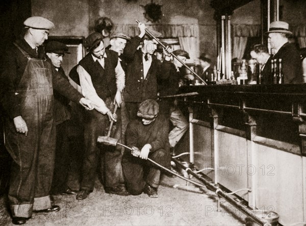 A bar in Camden, New Jersey, being forcibly dismantled by dry agents, USA, 1920s. Artist: Unknown