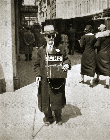 Blind man begging, Great Depression, New York, USA, 1933. Artist: Unknown