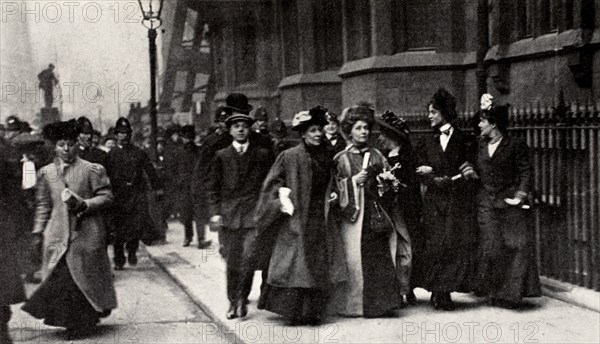 Emmeline Pankhurst, British suffragette leader, carrying a petition, London, 13 February 1908. Artist: Unknown
