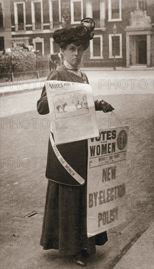 Miss Kelly, a suffragette, selling Votes for Women, July 1911. Artist: Unknown