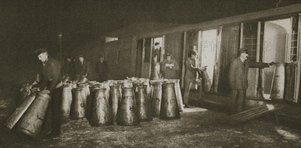 Unloading a milk train, London, 20th century. Artist: Unknown