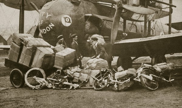 Loading Vickers-Vimy aircraft 'City of London' with motorbike frames for Cologne, c1919-c1929(?) Artist: Unknown