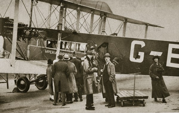 Passengers boarding an Imperial Airways aircraft for a flight to Paris, c1924-c1929 (?) Artist: Unknown
