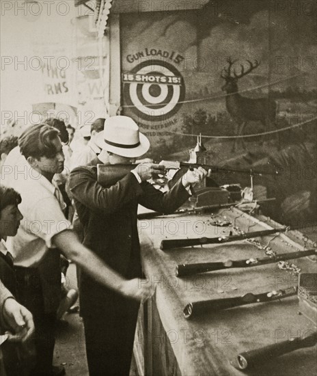 Shooting gallery at the amusement park, Coney Island, New York, USA, early 1930s. Artist: Unknown