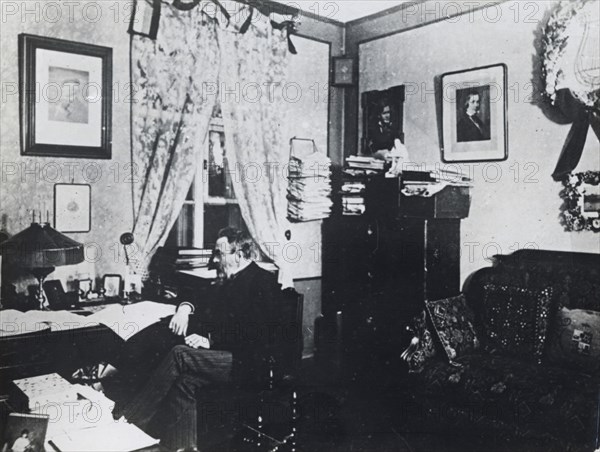 Nikolai Rimsky-Korsakov, Russian composer, in his study, St Petersburg, Russia, 1892. Artist: Unknown