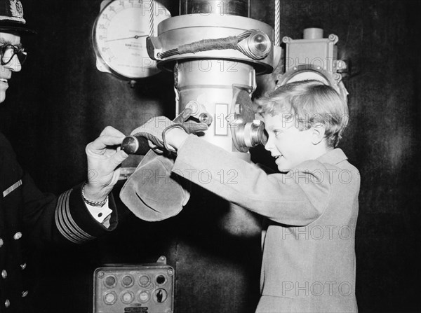 Crown Prince Carl Gustaf of Sweden on a submarine at an exhibition, Stockholm, Sweden, 1956. Artist: Unknown