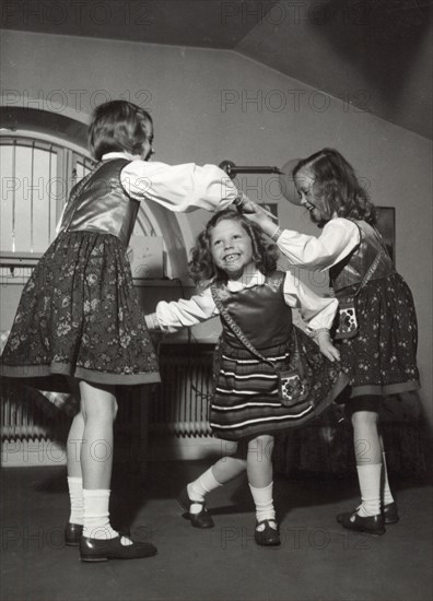 Princesses Margaretha, Desiree and Birgitta of Sweden dancing, April 1943. Artist: Karl Sandels