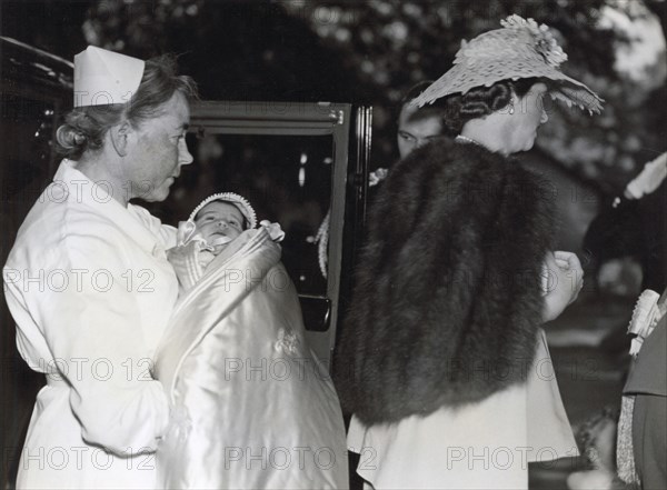 Christening of Princess Desiree of Sweden at the Church of Solna, Sweden, 30 June 1938. Artist: Karl Sandels