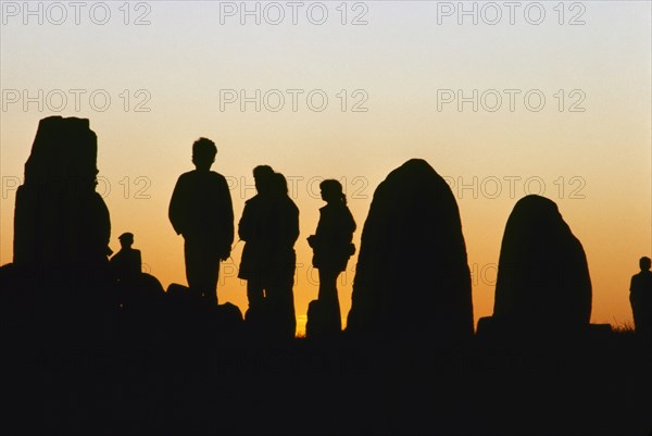 People by Ale's Stones, Kåseberga, Scania, Sweden. Artist: Stefan Hallberg