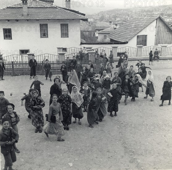 Schoolchildren in the playground, Sarajevo, Bosnia-Hercegovina, Yugoslavia, 1939. Artist: Unknown