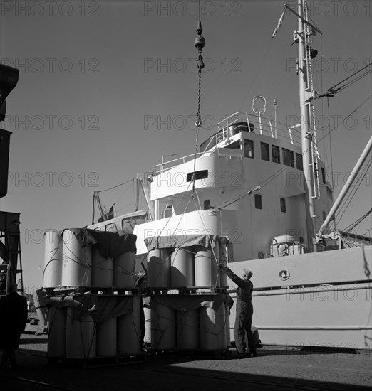 Loading cargo in the harbour of Gothenburg, Sweden, 1960. Artist: Torkel Lindeberg