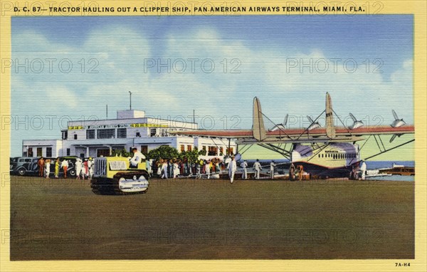 Tractor hauling out a flying boat, Pan-American Airways terminal, Miami, Florida, USA, 1937. Artist: Unknown