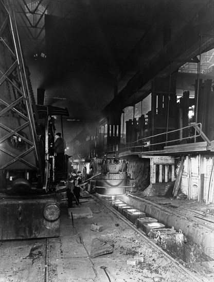 Teeming (pouring) molten steel, Park Gate Iron & Steel Co, Rotherham, South Yorkshire, April 1955. Artist: Michael Walters