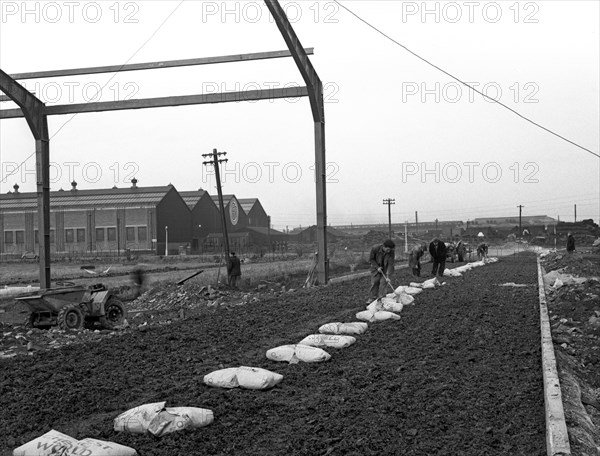 Road construction work, Doncaster, South Yorkshire, November 1955. Artist: Michael Walters