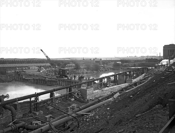 Construction of the reservoir, Manvers Main Colliery, Wath upon Dearne, South Yorkshire, 1955. Artist: Michael Walters