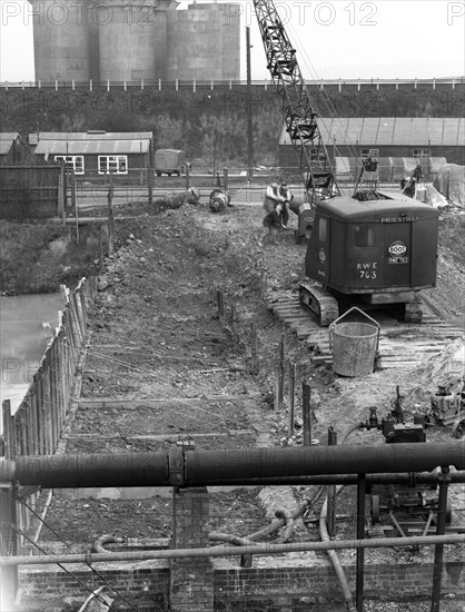 Construction of the reservoir, Manvers Main Colliery, Wath upon Dearne, South Yorkshire, 1955. Artist: Michael Walters