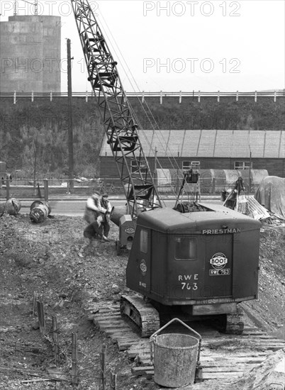 Construction of the reservoir, Manvers Main Colliery, Wath upon Dearne, South Yorkshire, 1955. Artist: Michael Walters