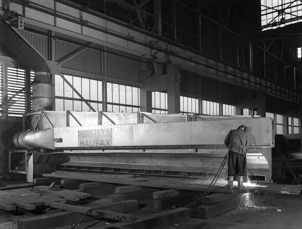 Steelworker at Park Gate Iron and Steel Co, Rotherham, South Yorkshire, April 1964.  Artist: Michael Walters