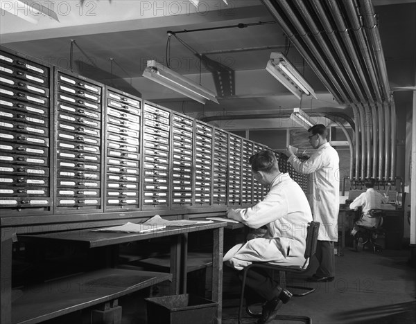 Pneumatic Tube Transport system at at Duckmanton Colliery stores near Chesterfield, 1962. Artist: Michael Walters