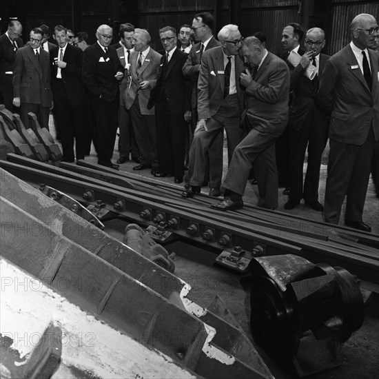 Inspecting a tram junction, made at the Edgar Allen Steel Foundry, Meadowhall, Sheffield, 1962. Artist: Michael Walters
