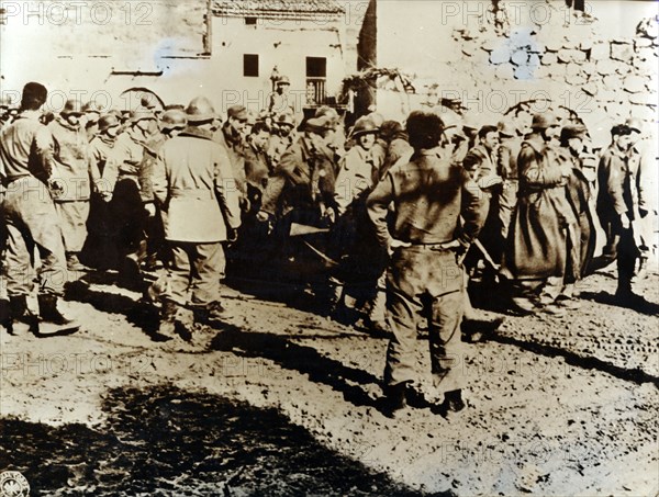 Moroccan Tirailleurs capture a troop of German soldiers, Cardito, Italy, c1944. Artist: Unknown