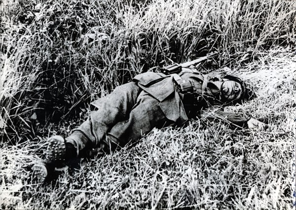 A German soldier killed during the invasion of Normandy, 1944. Artist: Unknown