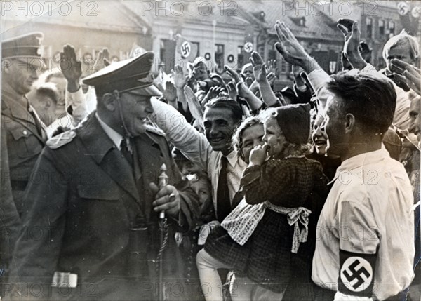 Hermann Göring, German Nazi politician and military leader, taking the salute, c1930s-c1940s. Artist: Unknown