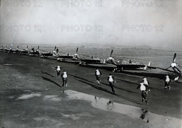 Pilots running to their aircraft, Battle of Britain, 1940. Artist: Unknown