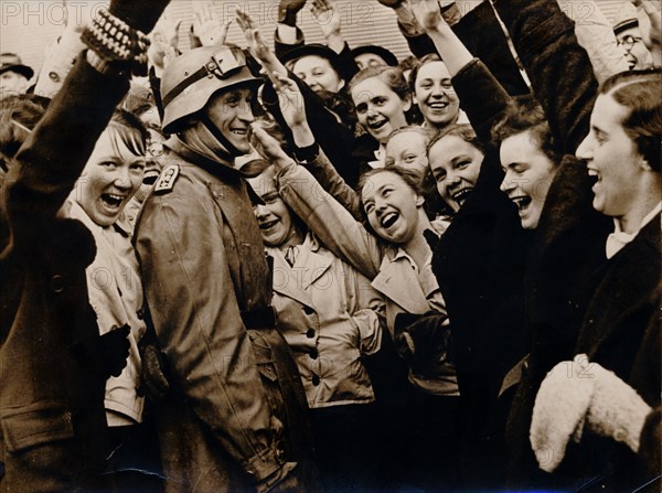 German motorized troops are greeted on their arrival in Vienna, Austria, 1938. Artist: Unknown