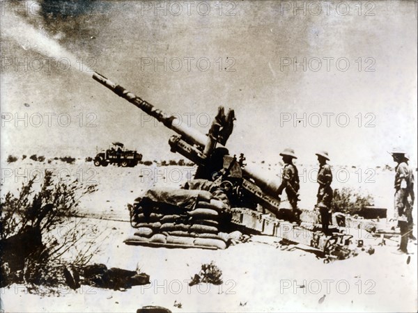 A British artillery piece in action, south of El Alamein, 1942. Artist: Unknown