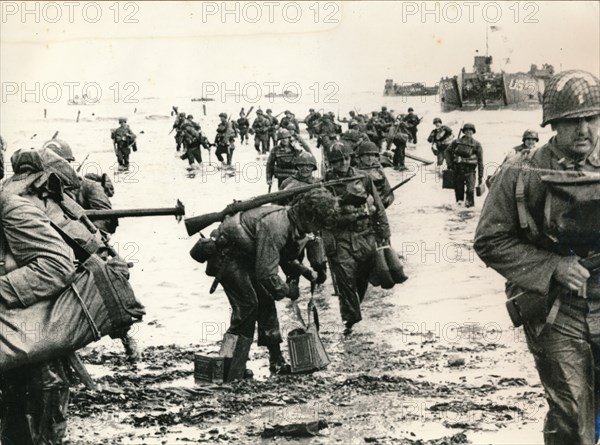 US assault troops landing on a beachhead, Normandy, 1944. Artist: Unknown
