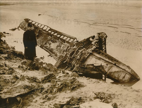 A German aircraft shot down on the English coast, c1939-c1945. Artist: Unknown