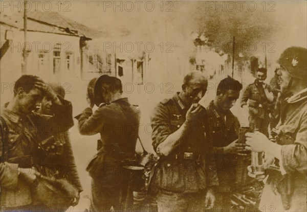 German troops take a break from the battle in Vitebsk, a city in Belarus, May 1944. Artist: Unknown