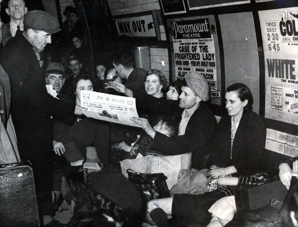 Paper seller down in the underground, London, c.1940. Artist: Unknown