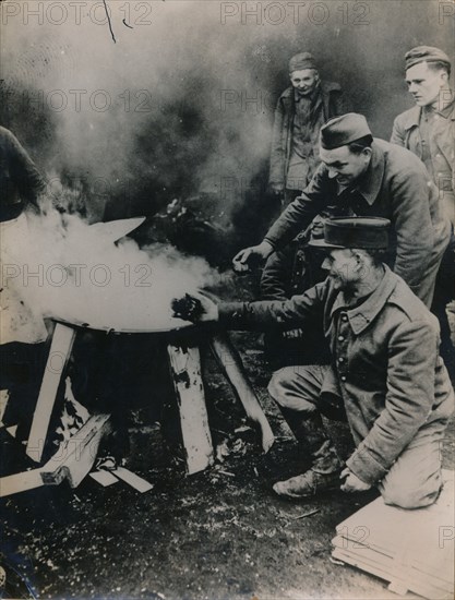 French prisoners cooking, c.1940s. Artist: Unknown