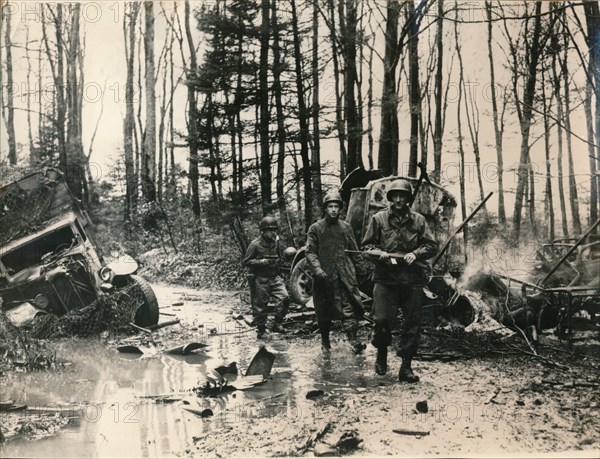 Wrecked German vehicles in a forest on the road to Saverne, November 1944. Artist: Unknown