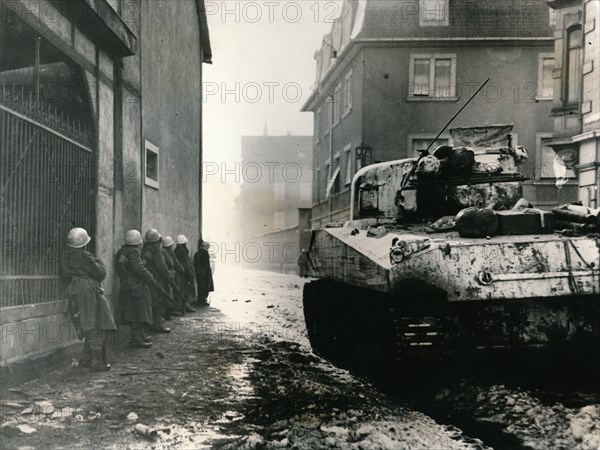 French troops take cover in Colmar, France, c.1940s. Artist: Unknown