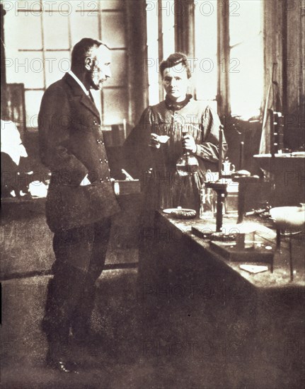 Pierre and Marie Curie in their Laboratory, pub. 1898 (photograph)