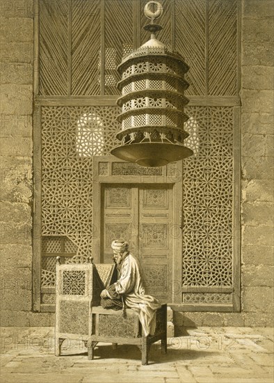 Cairo: Funerary or Sepuchral Mosque of Sultan Barquoq seated Imam reading the Koran, before a pierce Creator: Emile Prisse d'Avennes (1807-79).