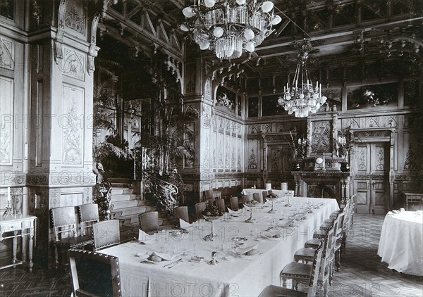 Dining room of the Imperial Palace in Bialowieza Forest, Russia, late 19th century.  Artist: Mechkovsky