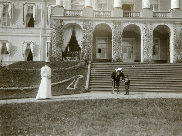 Tsarina Alexandra Fyodorovna with Tsarevich Alexei of Russia, c1907-c1910.  Artist: K von Hahn