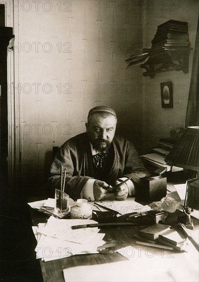 Alexander Kuprin, Russian author, at his desk, Gatchina, Russia, early 20th century.  Artist: Karl Karlovich Bulla