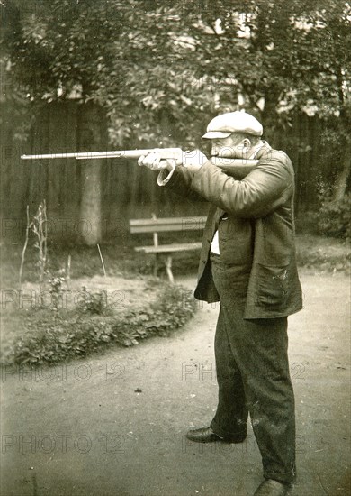 Russian author Alexander Kuprin shooting, Gatchina, Russia, early 20th century.  Artist: Karl Karlovich Bulla