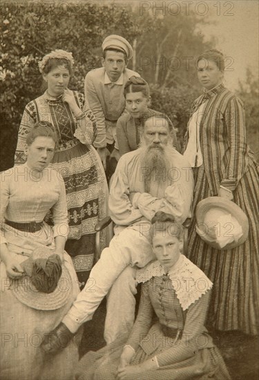 Russian author Leo Tolstoy with his family, Yasnaya Polyana, Russia, late 19th century(?).  Artist: Semyon Abamalek-Lazarev