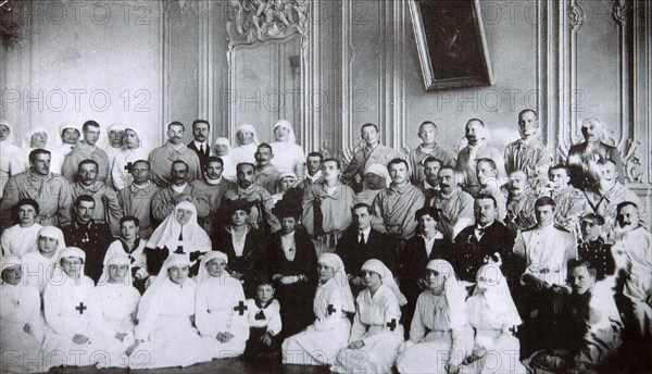 Tsarina Maria Fyodorovna of Russia visiting a hospital in Kiev, 1915. Artist: Unknown