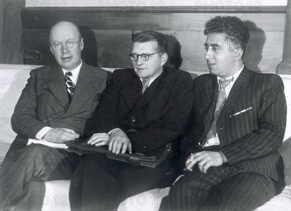 Sergei Prokofiev, Dmitri Shostakovich and Aram Khachaturian, Russian composers, 1945. Artist: Unknown